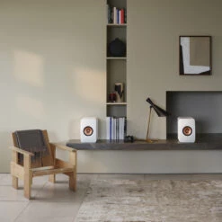 KEF LS50 Wireless II Powered Bookshelf Speaker System -Trendy Electronic Audio Supplies Store 20 KEF LS50Wireless II MineralWhite StoneLedge Lifestyle 1050x1050 1