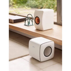 KEF KC62 Compact Powered Subwoofer -Trendy Electronic Audio Supplies Store 21 KEF KC62 Lifestyle LS50MetaWhite BeautyShot 1050x1050 1