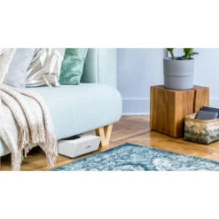 Bluesound PULSE SUB+ Wireless Powered Subwoofer -Trendy Electronic Audio Supplies Store Bluesound20PULSE20SUB20WHT20on20floor20under20couch 1920x1080px 1050x1050 1